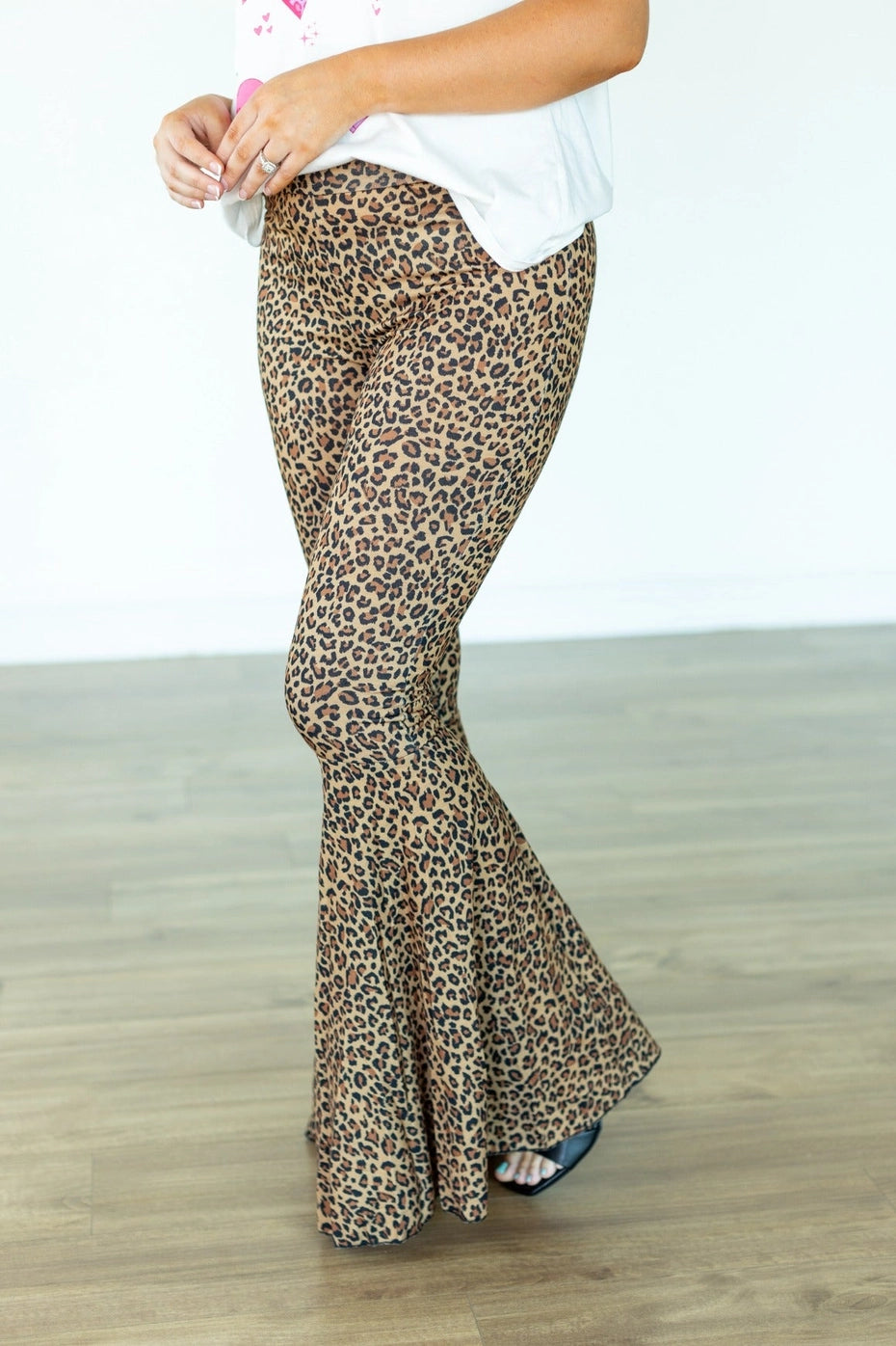 Leopard Flare Pants are bold and stylish, perfect for making a statement. Featuring a striking leopard print design and dramatic flared legs.