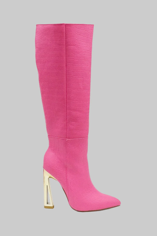 Croc Knee-High Boots are a bold statement piece designed to elevate any outfit. Featuring an eye-catching croc-embossed texture and a vibrant pink hue.