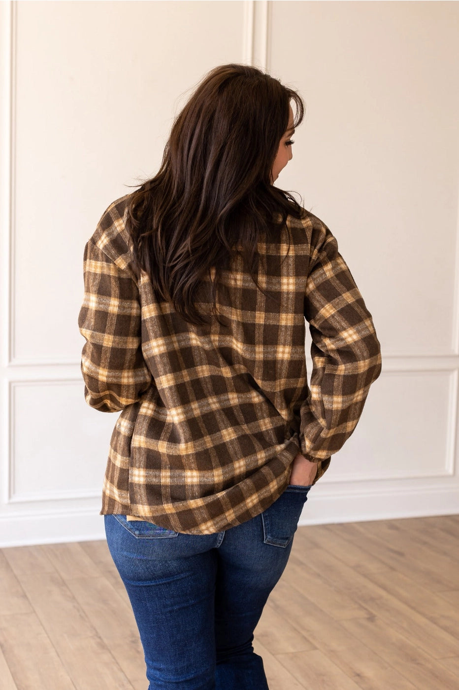 Oversized Plaid Shacket is the ultimate blend of comfort and style. Featuring a classic plaid pattern and an oversized fit.