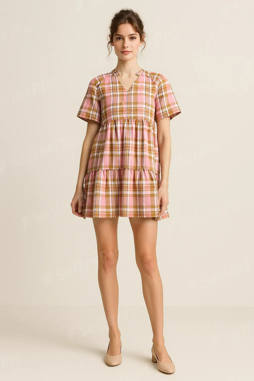 A pink and orange plaid Babydoll dress.