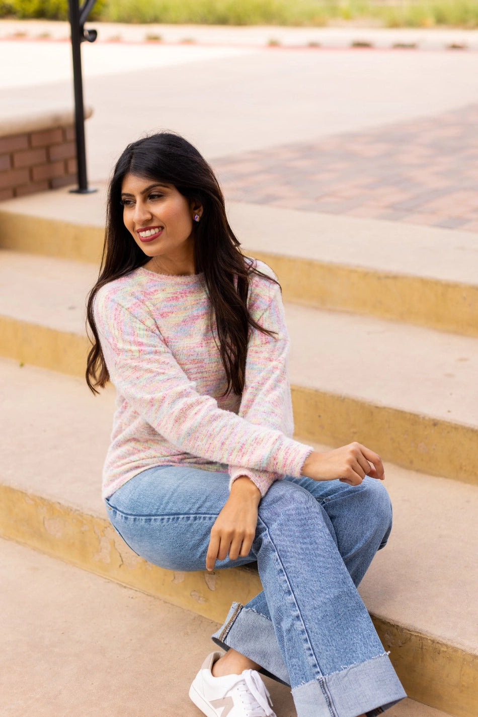 A multicolor Knit Top adds a vibrant, playful touch to your wardrobe. Crafted from a soft and stretchy blend, this top offers all-day comfort. Featuring a relaxed fit and a beautiful heathered multicolor knit design.
