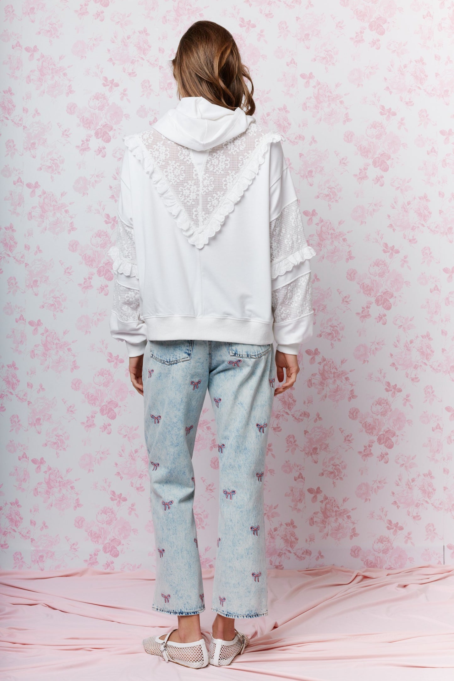 Embroidered Cropped Denim Jeans bring a playful twist to classic denim. Featuring a cropped length and all-over embroidered bow detail.