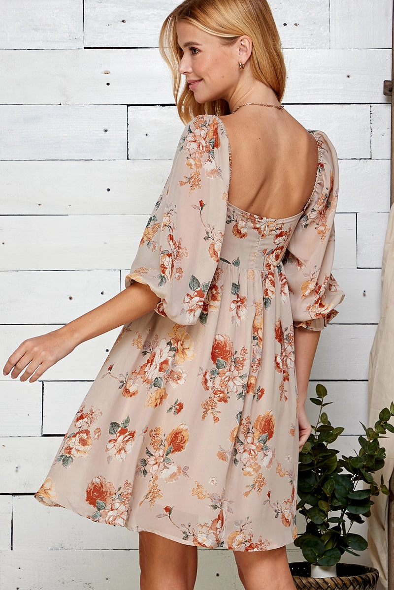 Oatmeal Floral Chiffon Babydoll Dress is a charming and romantic piece perfect for daytime outings or special gatherings. Made from lightweight sheer chiffon fabric with a vintage floral print, this dress features a square neckline with elasticized shoulders.