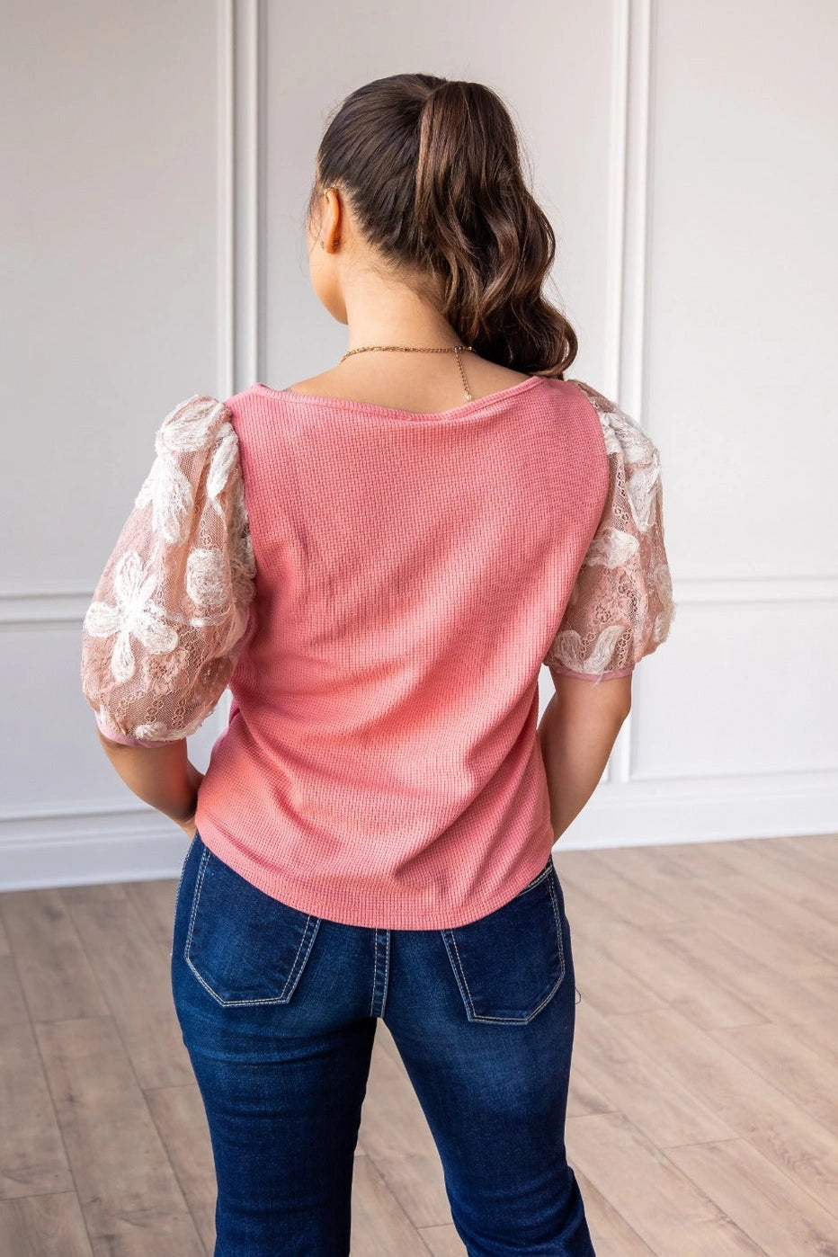 Pink Lace Puff Sleeve Top is a perfect combination of elegance and simplicity. Featuring delicate sheer lace puff sleeves and a classic boat neckline.