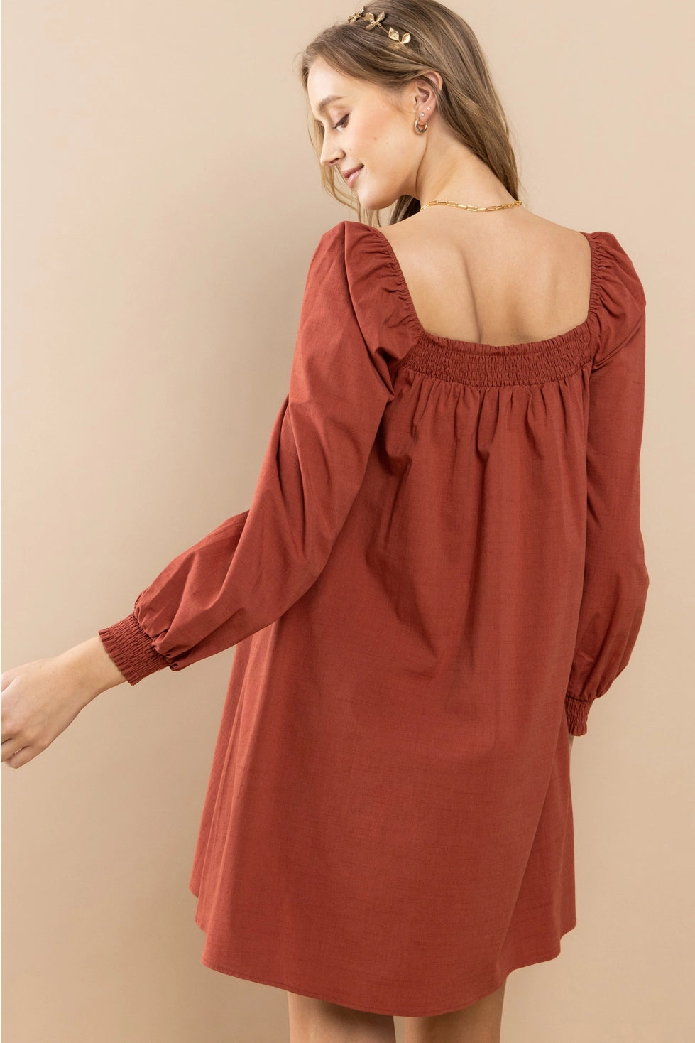 Rust Smocked Shoulder Dress Featuring smocking details on the shoulders.
