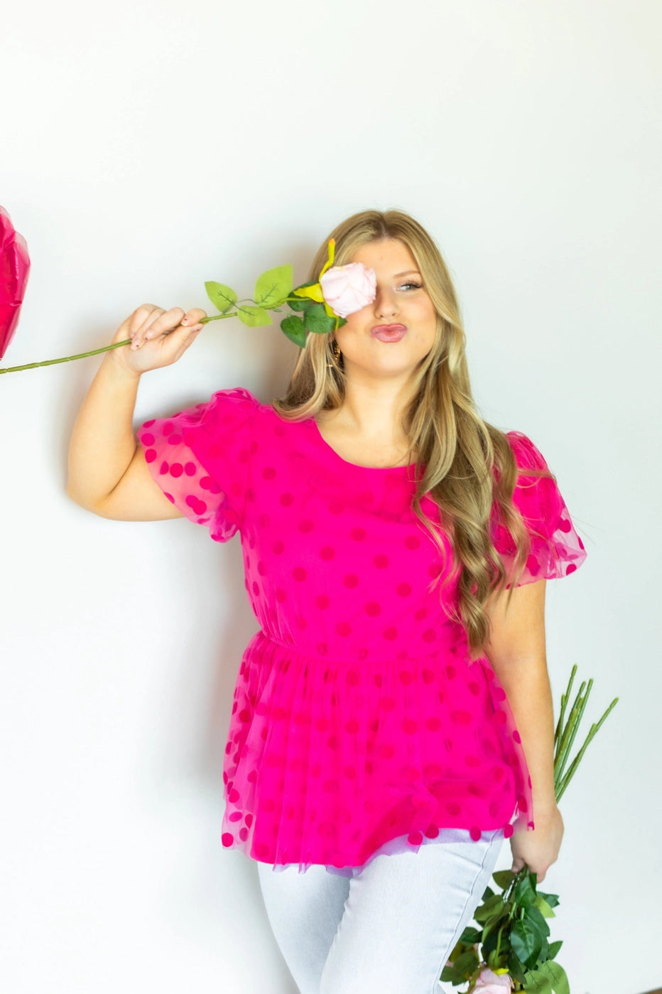 Polka Dot Peplum Blouse is a chic and versatile piece designed for effortless transitions from day to date night. Featuring a crew neck, flattering peplum silhouette, and an elastic waistband.