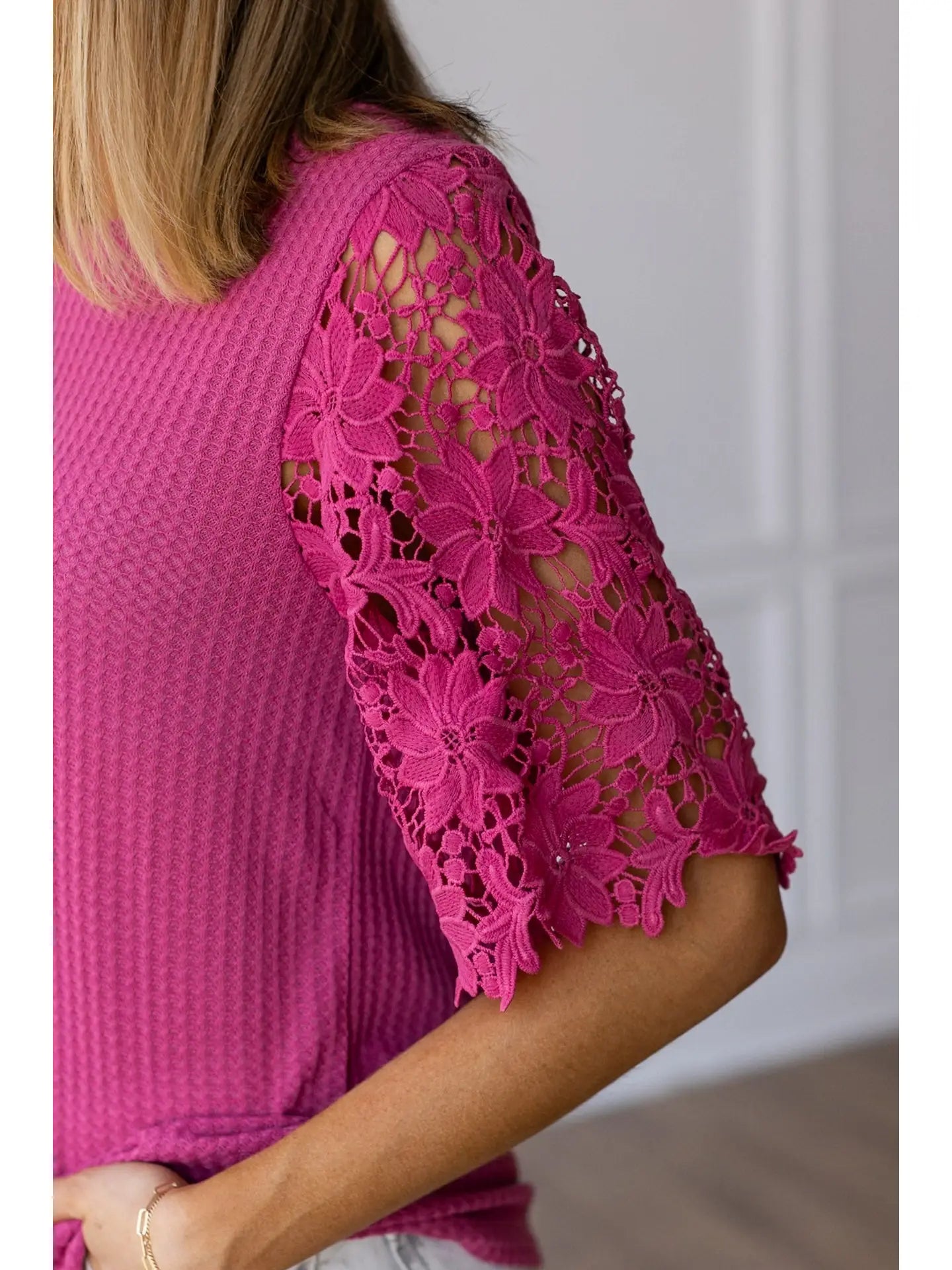 Lace Sleeve Top effortlessly combines comfort and elegance. Featuring a relaxed fit and delicate lace sleeves.