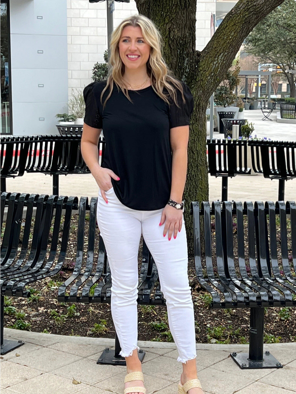 Eyelet Puff Sleeve Top is a chic and versatile wardrobe essential. Featuring elegant eyelet puff sleeves and a flattering silhouette.