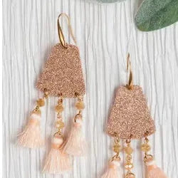 Rose gold tassel earrings on a white background with 'Ashlyn Rose' branding.