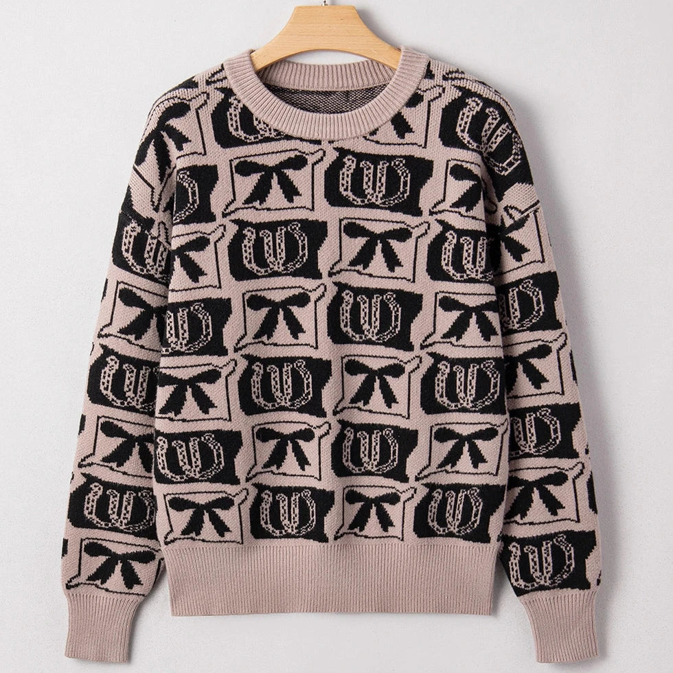 Western Print Sweater makes a bold statement with its unique bows and horseshoes pattern.