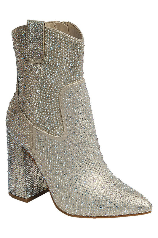 Rhinestone Ankle Boots in champagne are a dazzling statement piece designed to elevate any outfit. Featuring a sleek pointed toe and chunky block heel.