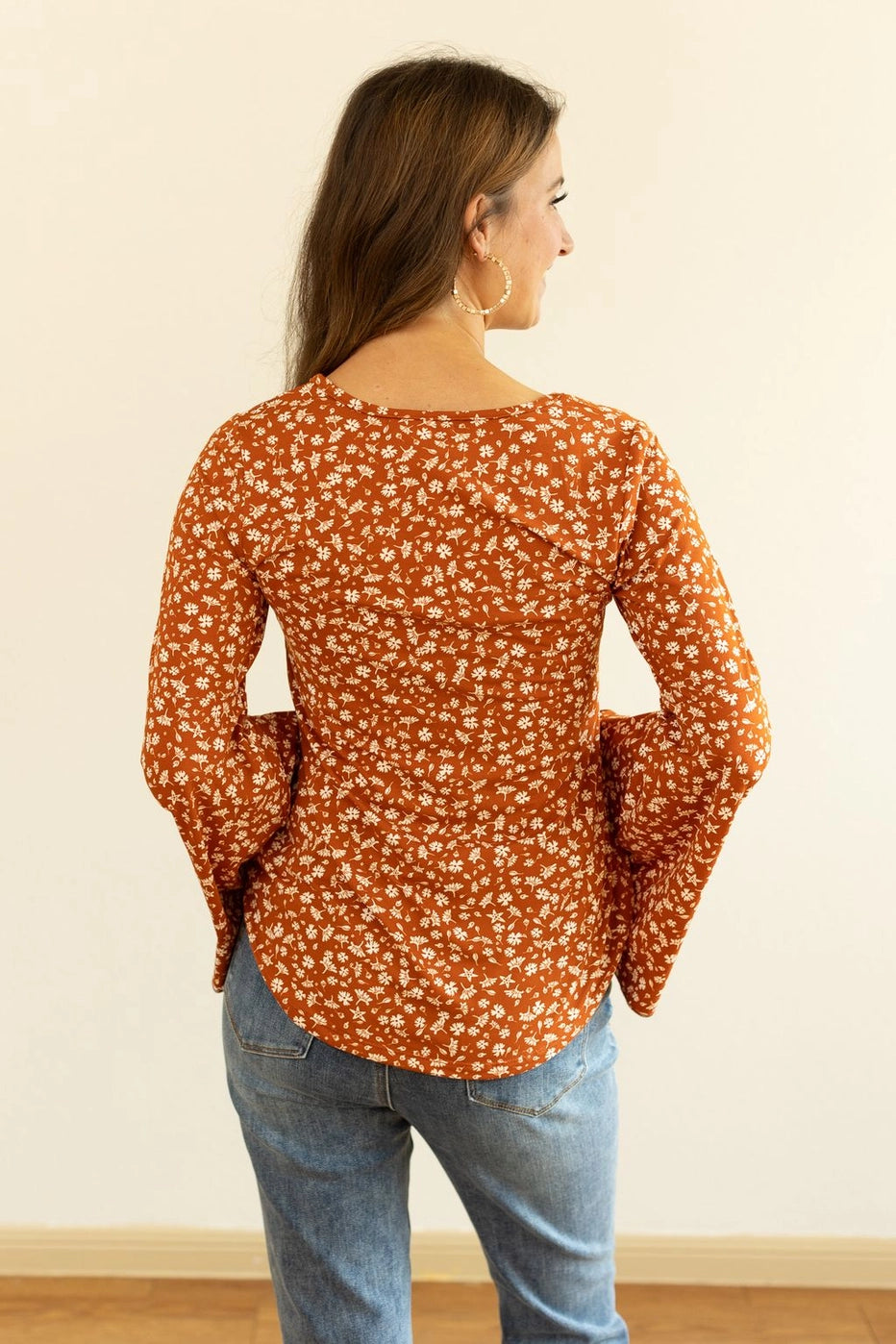 Floral Bell Sleeve Top is a charming blend of comfort and boho-inspired style. Featuring a relaxed fit, high stretch fabric, and unlined construction.