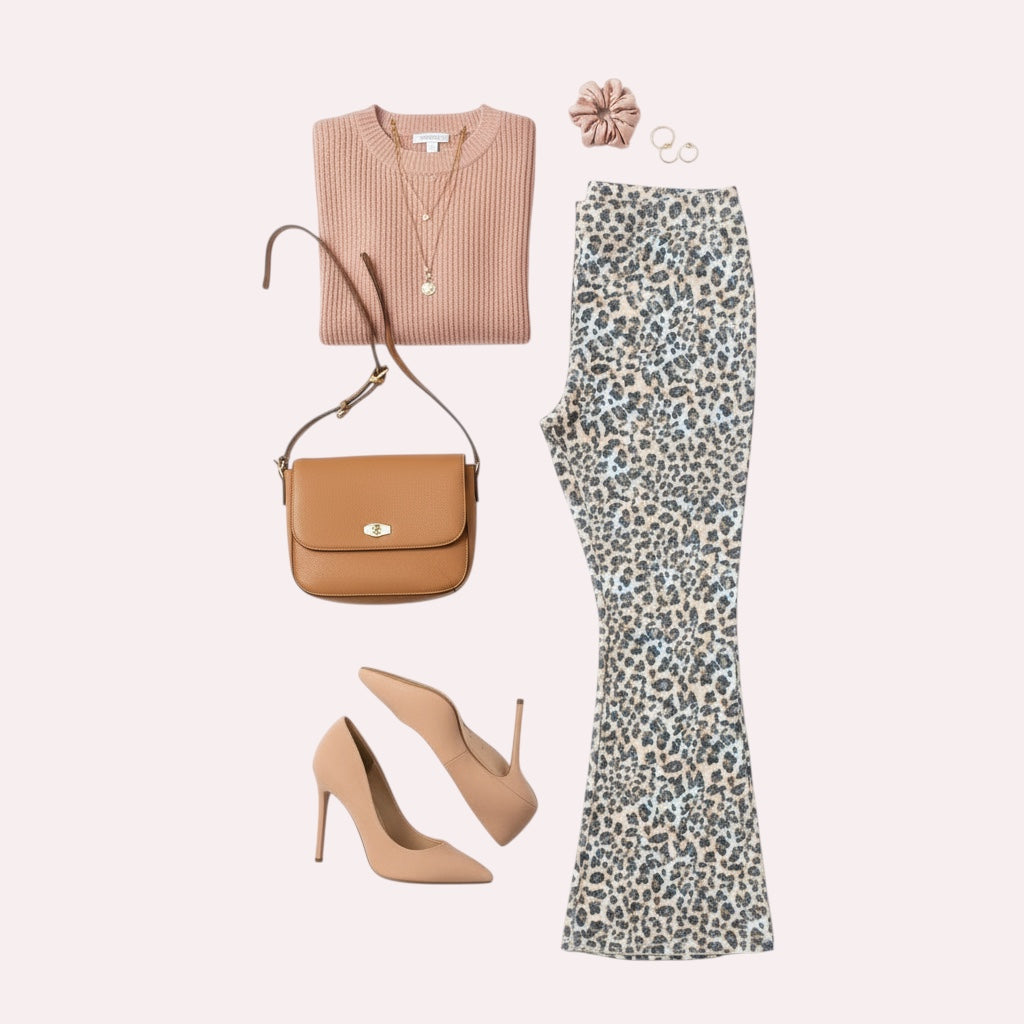 Fashionable outfit with pink top, leopard print pants, brown handbag, and beige heels on a white background