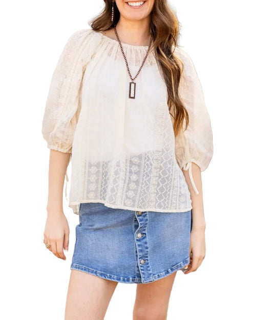Peasant Blouse exudes effortless charm with its relaxed fit and lightweight feel. Featuring adjustable sleeves and a matching belt crafted from the same fabric.