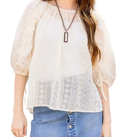 Peasant Blouse exudes effortless charm with its relaxed fit and lightweight feel. Featuring adjustable sleeves and a matching belt crafted from the same fabric.