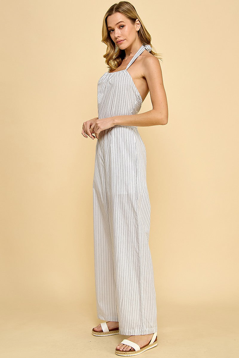 Striped Halter Jumpsuit is a chic and breezy one-piece outfit perfect for warm-weather occasions. Featuring a flattering waistband and a tie-back halter neckline.