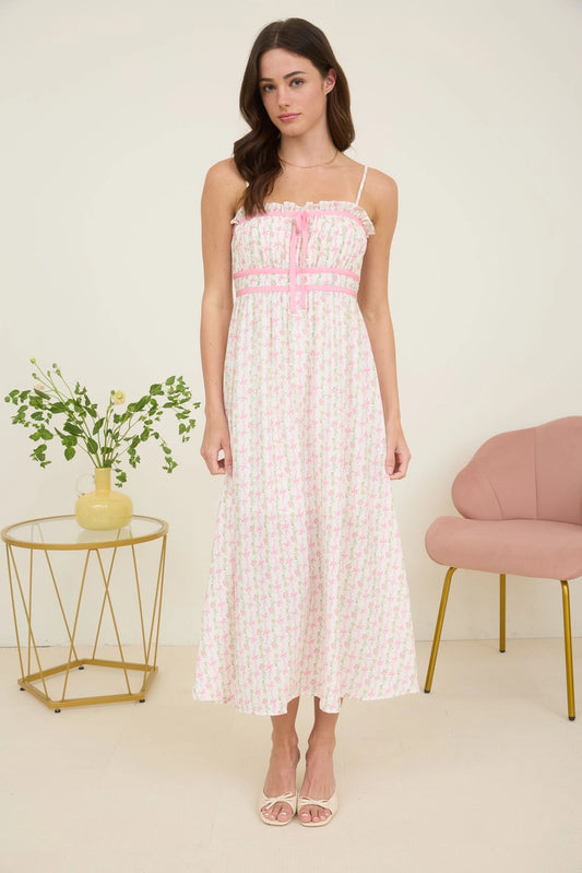 Pink Floral Bow Midi Dress. Featuring a square neckline with ruffle trim and adjustable spaghetti straps.