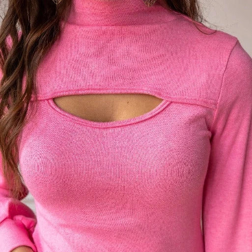 Hot Pink Cutout High-Neck Top is a trendy and sophisticated piece that combines modern design with a flattering fit.