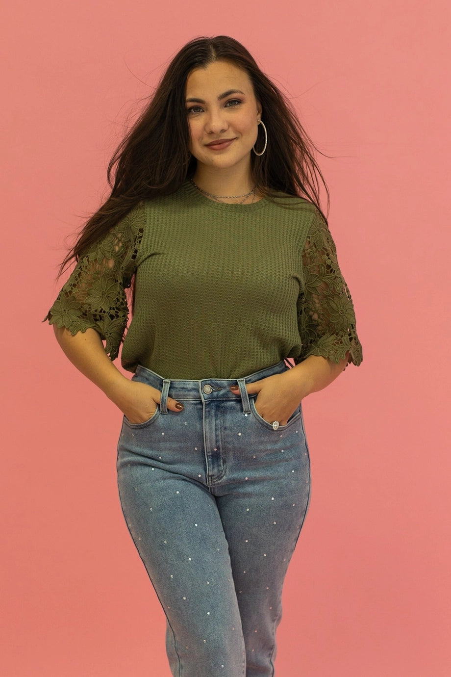 Lace Sleeve Top effortlessly combines comfort and elegance. Featuring a relaxed fit and delicate lace sleeves.