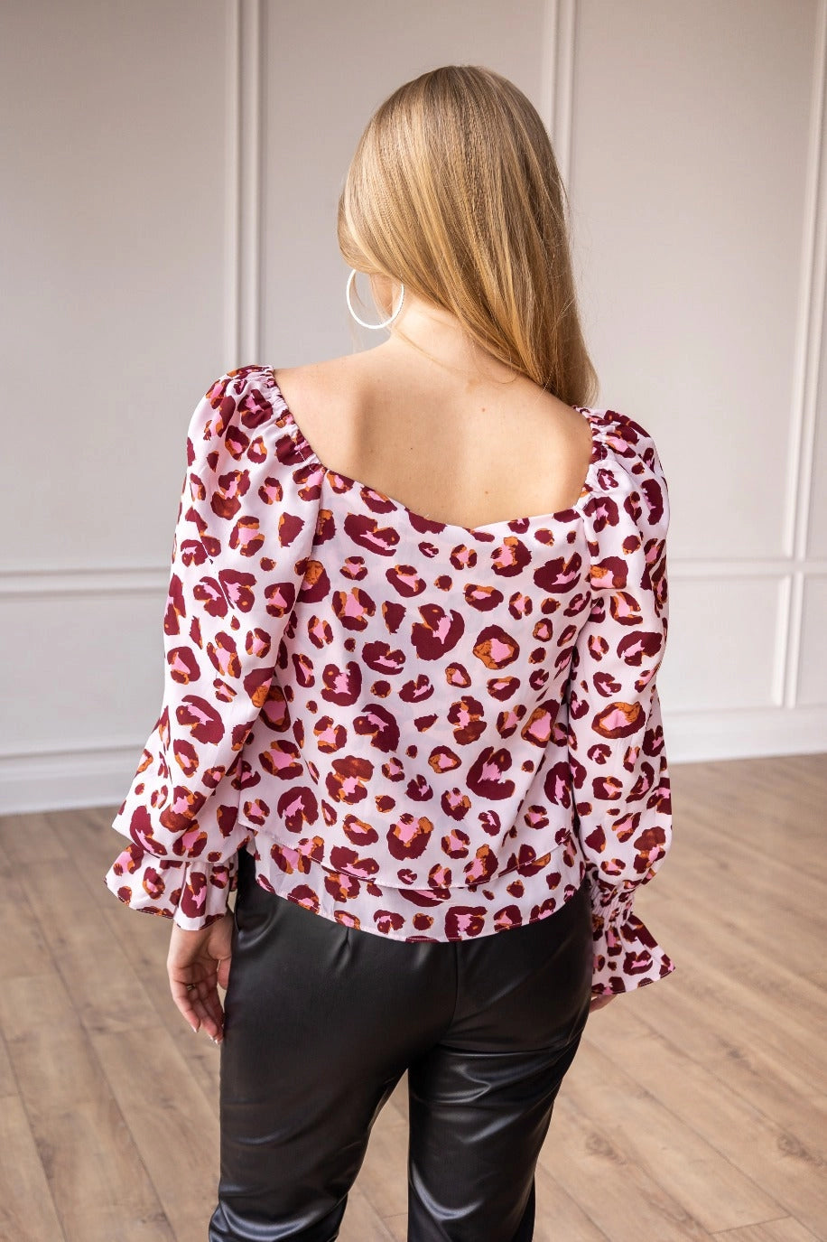 Off-Shoulder Leopard Print Top is a stylish blend of boldness and elegance. Featuring an eye-catching leopard print design.