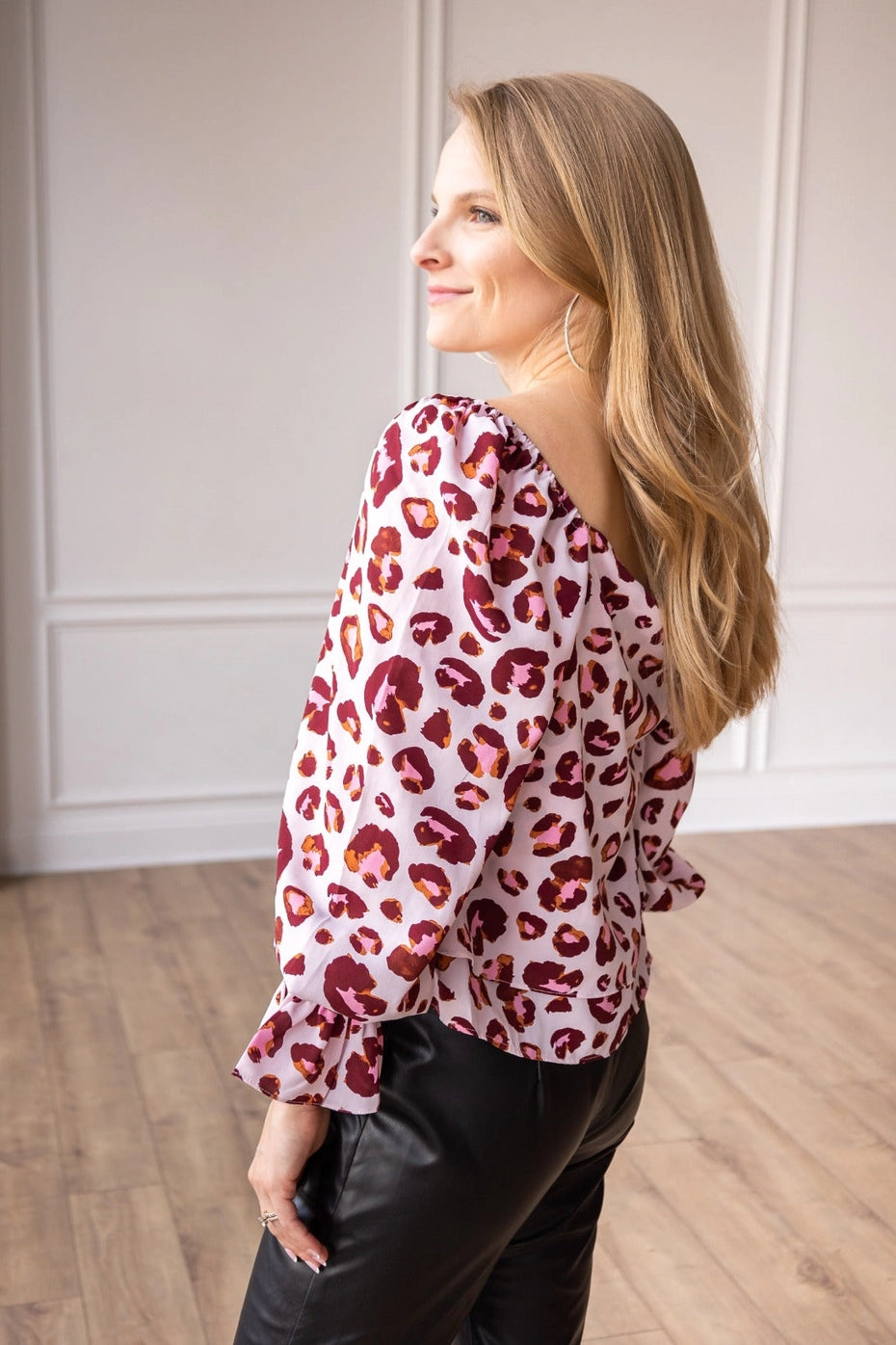 Off-Shoulder Leopard Print Top is a stylish blend of boldness and elegance. Featuring an eye-catching leopard print design.