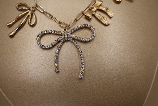 Dazzling Bow Charm Paperclip Bracelet