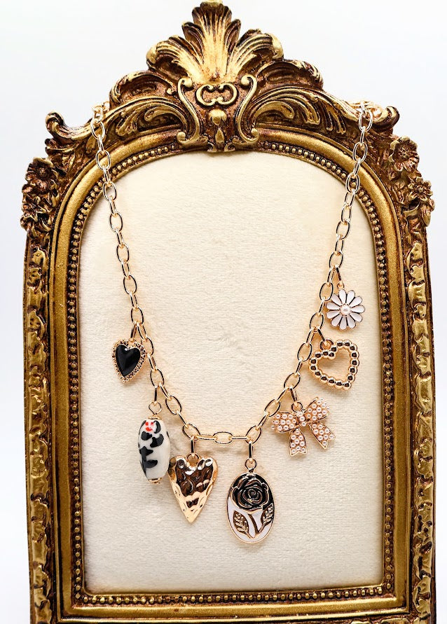 Bow Pendant Necklace is a refined and graceful piece, designed to add a touch of understated elegance to your look. Featuring three petite bow-shaped charms on a delicate gold-tone chain.