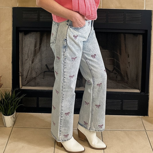 Embroidered Cropped Denim Jeans bring a playful twist to classic denim. Featuring a cropped length and all-over embroidered bow detail.