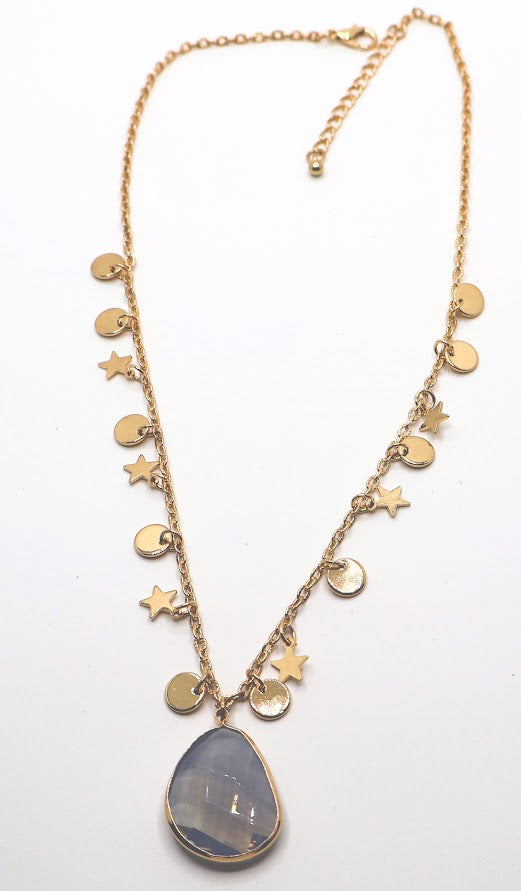 Gold necklace opal-like pendant, playful charms and a radiant gold chain.