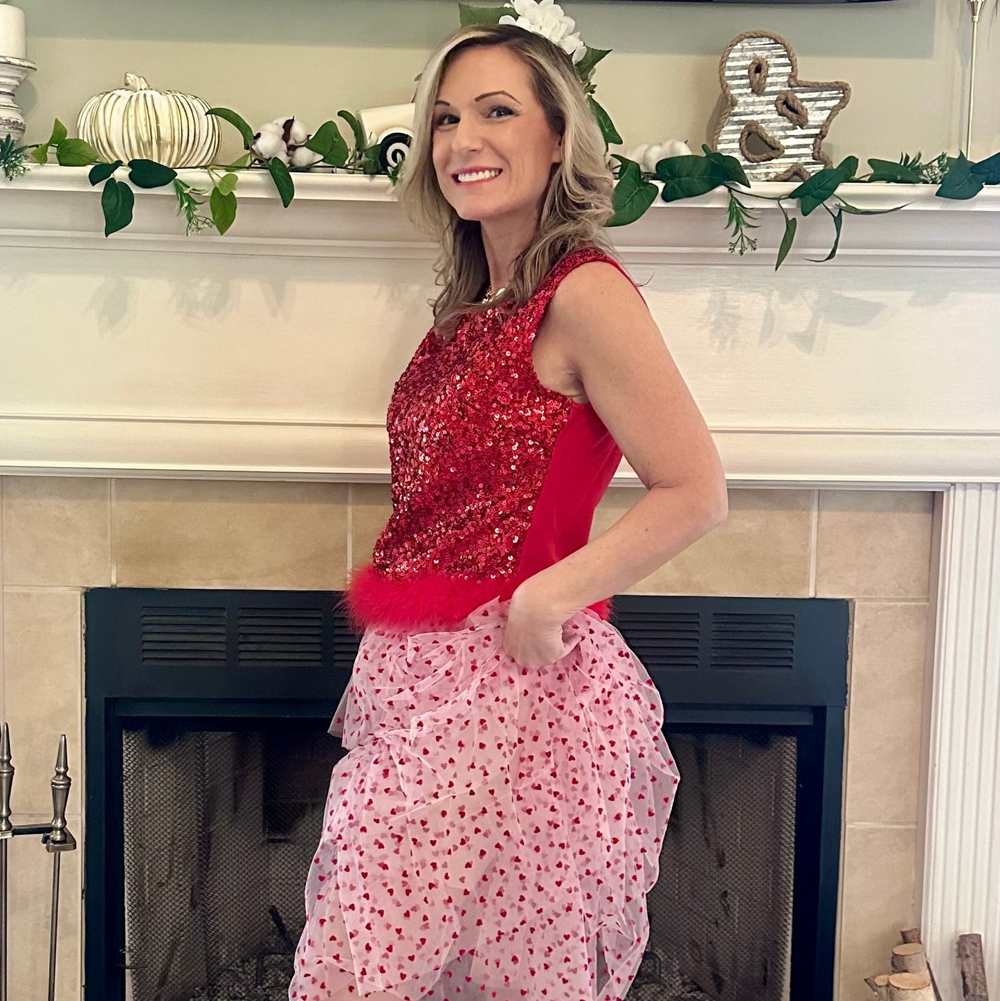 Heart Tiered Tulle Skirt is a whimsical and romantic piece perfect for adding a playful touch to your wardrobe. Featuring multiple layers of soft tulle adorned with delicate heart patterns.