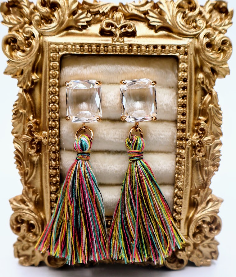 Multicolored tassel earrings. Featuring sparkling crystal studs.