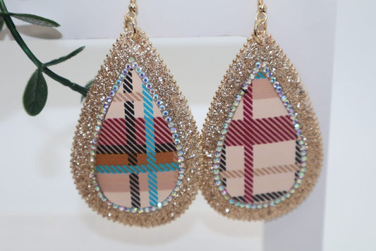 Teardrop-shaped earrings with plaid design and gold glitter accents.