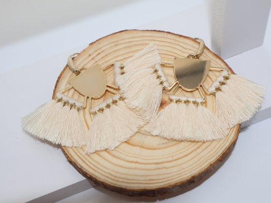 Boho Fan-shaped Tassel Earrings! Feature a combination of soft tassels and gold elegant geometric shapes.