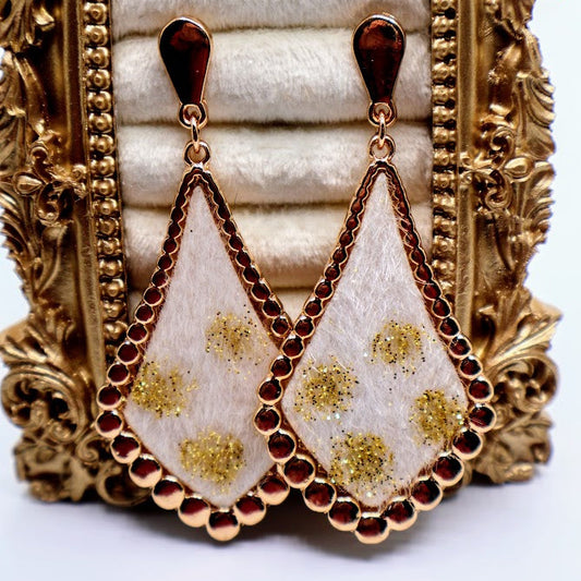 Ivory Gold-Dusted Earrings featuring a stunning ivory-toned teardrop design, delicately dusted with golden floral accents and framed by a shimmering beaded edge.