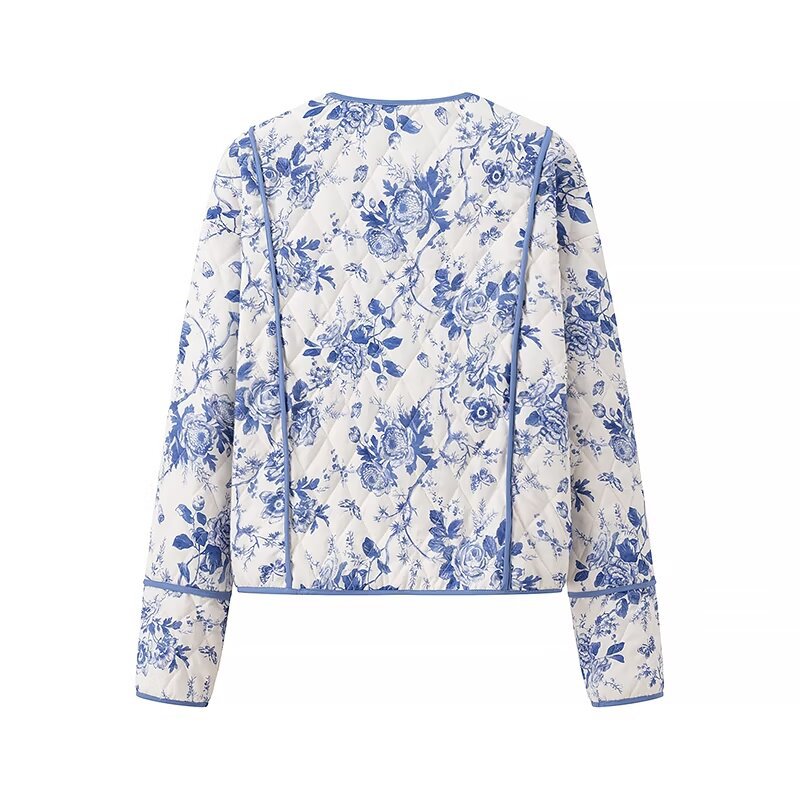 Blue Floral Quilted Jacket is a timeless and elegant piece that offers both style and comfort. Featuring a classic blue-and-white floral pattern, this lightweight quilted jacket is perfect for layering during cooler seasons.