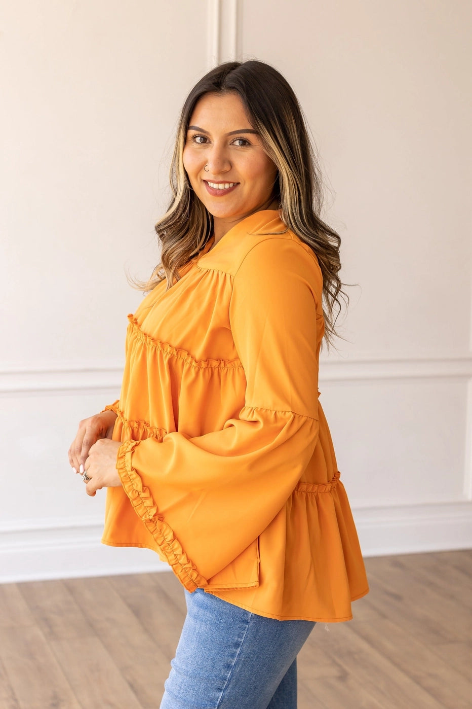 Orange Babydoll Top is a breezy and feminine piece designed for both comfort and style. With its relaxed fit and flowy tiered silhouette.