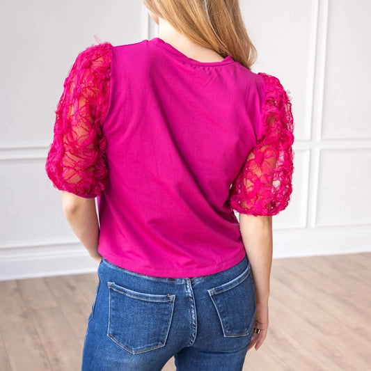 Magenta Lace Puff Sleeve Top is a perfect combination of elegance and simplicity. Featuring delicate sheer lace puff sleeves and a classic boat neckline.