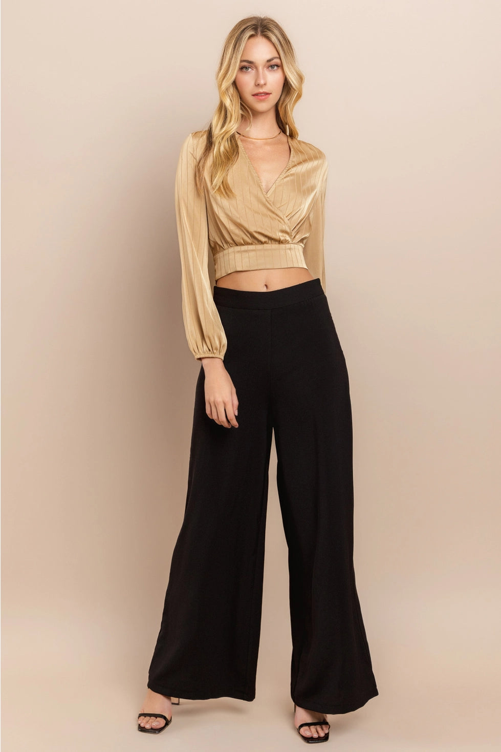 Beige Wrap Crop Top Made from lightweight polyester, this top features a flattering wrap design with a deep V-neckline and long sleeves.