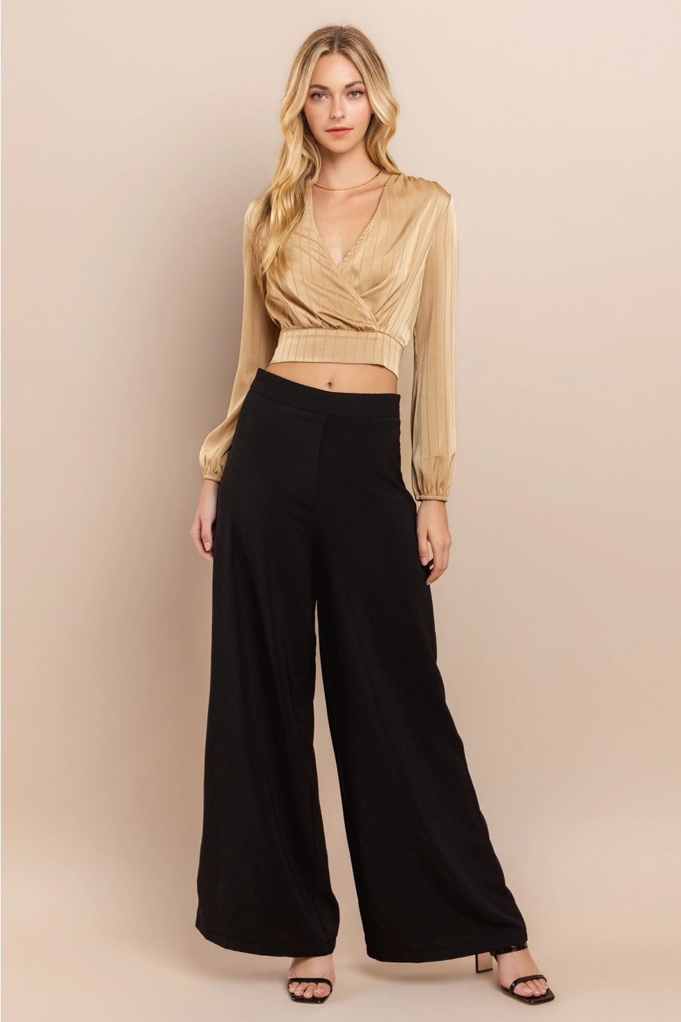 Beige Wrap Crop Top Made from lightweight polyester, this top features a flattering wrap design with a deep V-neckline and long sleeves.