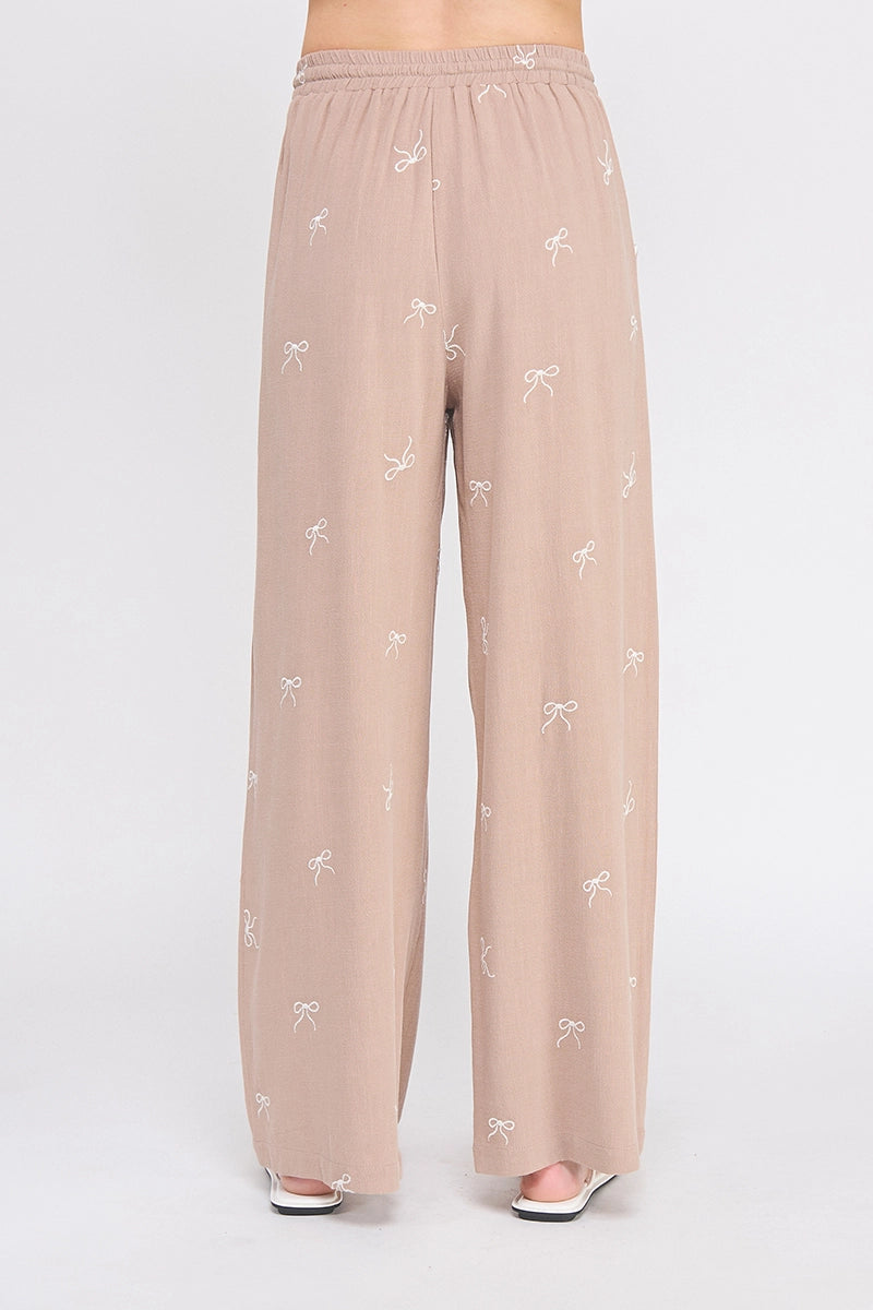 Beige Bow Embroidered Palazzo Pants.