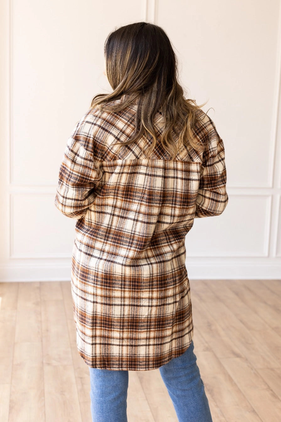 Plaid Flannel Shirt Dress is a versatile wardrobe essential that works beautifully as both a dress and a lightweight jacket.