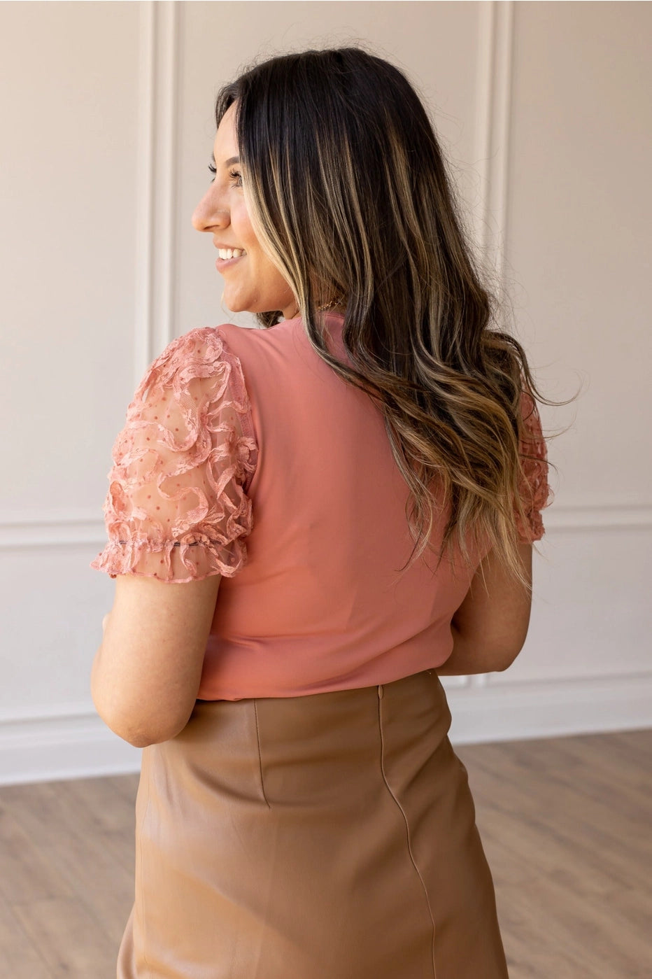 Lace Sleeve Bodysuit is a stunning piece that combines comfort and elegance. Featuring delicate lace puff sleeves and a flattering V-neckline.
