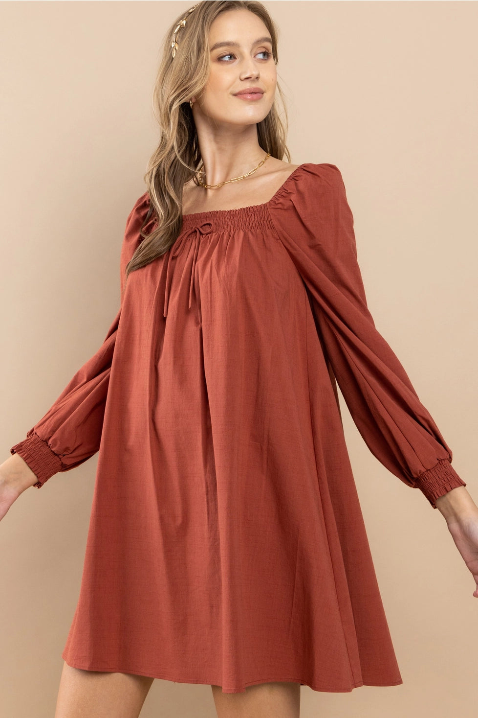 Rust Smocked Shoulder Dress Featuring smocking details on the shoulders.