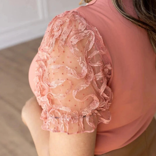 Lace Sleeve Bodysuit is a stunning piece that combines comfort and elegance. Featuring delicate lace puff sleeves and a flattering V-neckline.