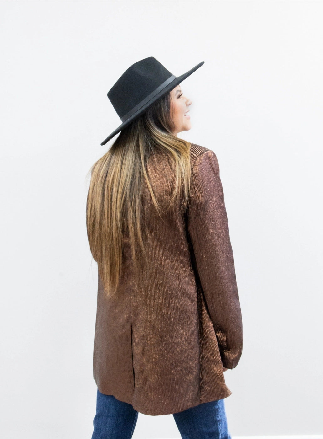 Metallic Blazer is a bold statement piece that effortlessly blends sophistication and glamour. Featuring a sleek metallic sheen, a lined interior, and functional pockets.