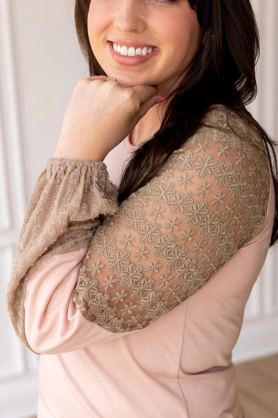 Lace Sleeve Top is a perfect blend of comfort and elegance. Featuring a relaxed fit, this top is designed with delicate lace balloon sleeves.