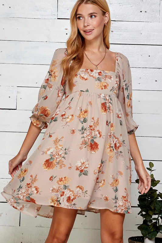 Oatmeal Floral Chiffon Babydoll Dress is a charming and romantic piece perfect for daytime outings or special gatherings. Made from lightweight sheer chiffon fabric with a vintage floral print, this dress features a square neckline with elasticized shoulders.
