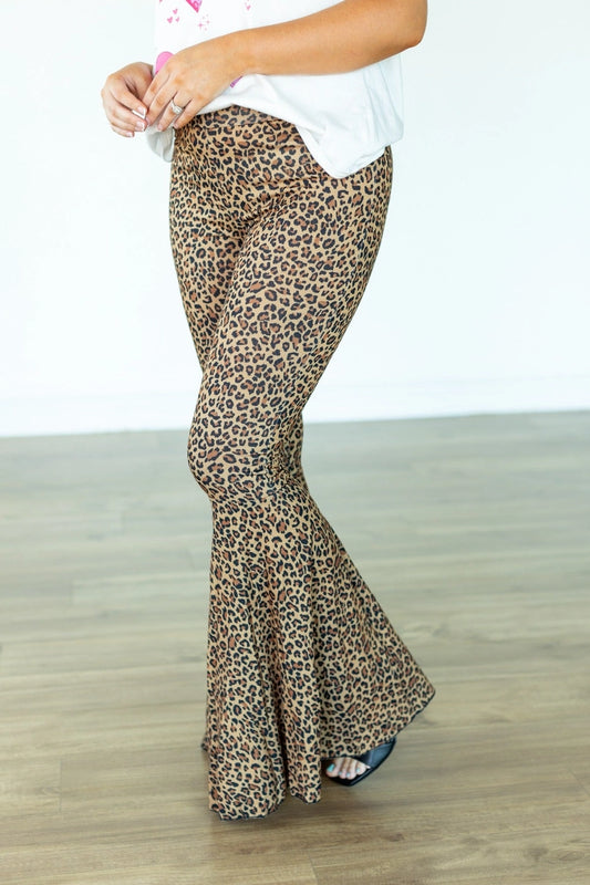 Leopard Flare Pants are bold and stylish, perfect for making a statement. Featuring a striking leopard print design and dramatic flared legs.