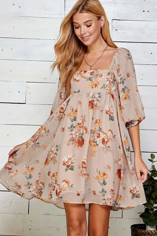 Oatmeal Floral Chiffon Babydoll Dress is a charming and romantic piece perfect for daytime outings or special gatherings. Made from lightweight sheer chiffon fabric with a vintage floral print, this dress features a square neckline with elasticized shoulders.