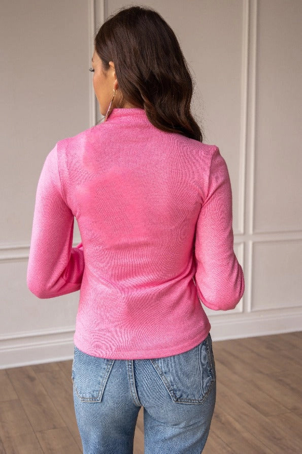 Hot Pink Cutout High-Neck Top is a trendy and sophisticated piece that combines modern design with a flattering fit. 